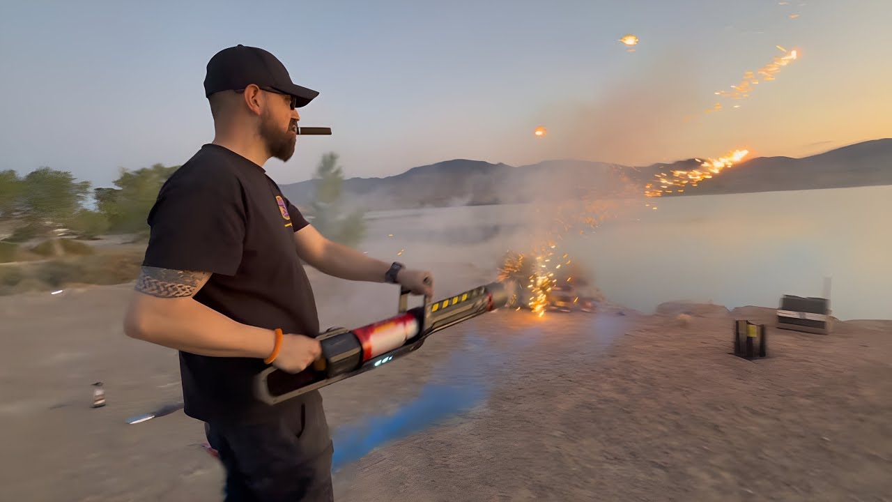 Beastlol — field testing at the lake, Roman candle Gatling, cigar in hand