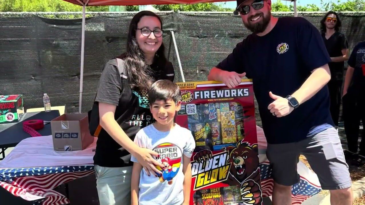 Beastlol meetup at Roseville Galleria — handing a Golden Glow assortment to a California family on the way to their July 4th show
